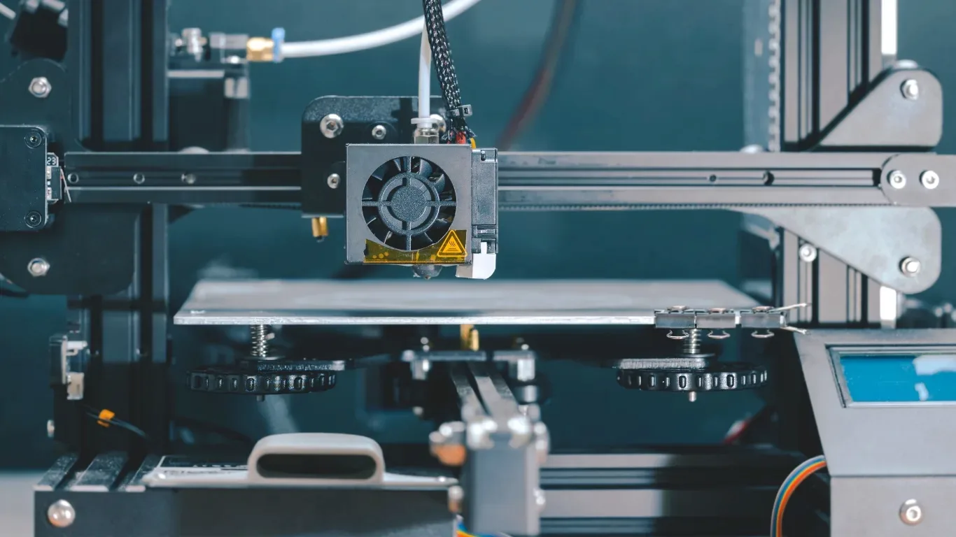 Industrial robot arm in manufacturing facility